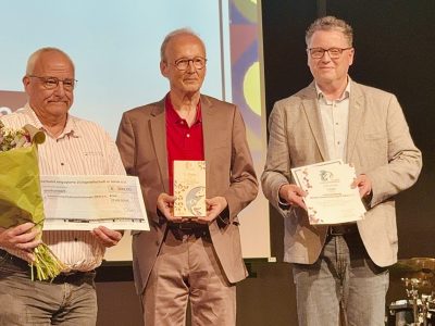 Dietmar Schmitz, Detlef Lichtrauter, Michael Millgramm (von links) bei der Preisverleihung